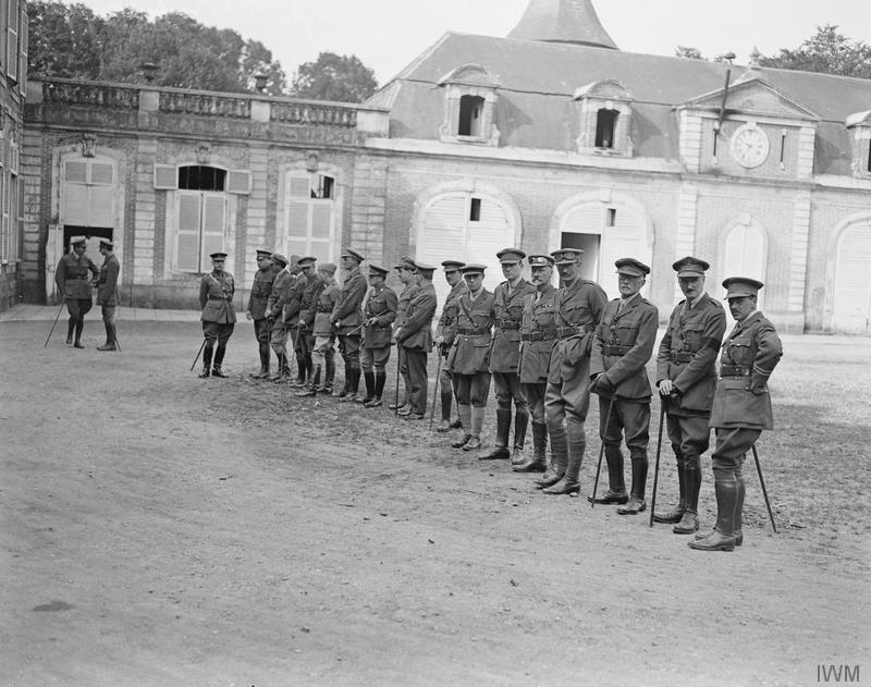 War correspondents waiting to be presented to George V
Outside the Tramecourt Chateau in...